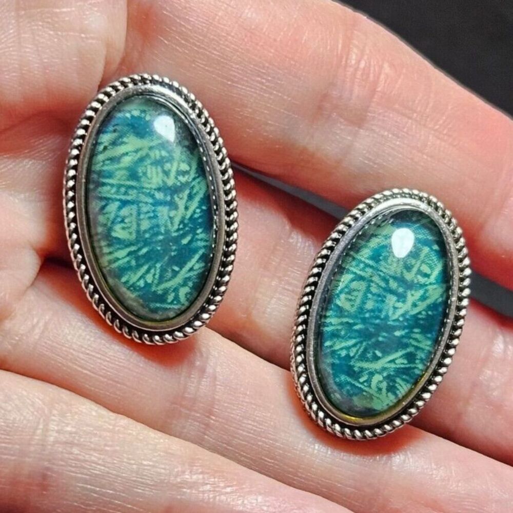 Napier gold tone and silver tone oval green clip on earrings